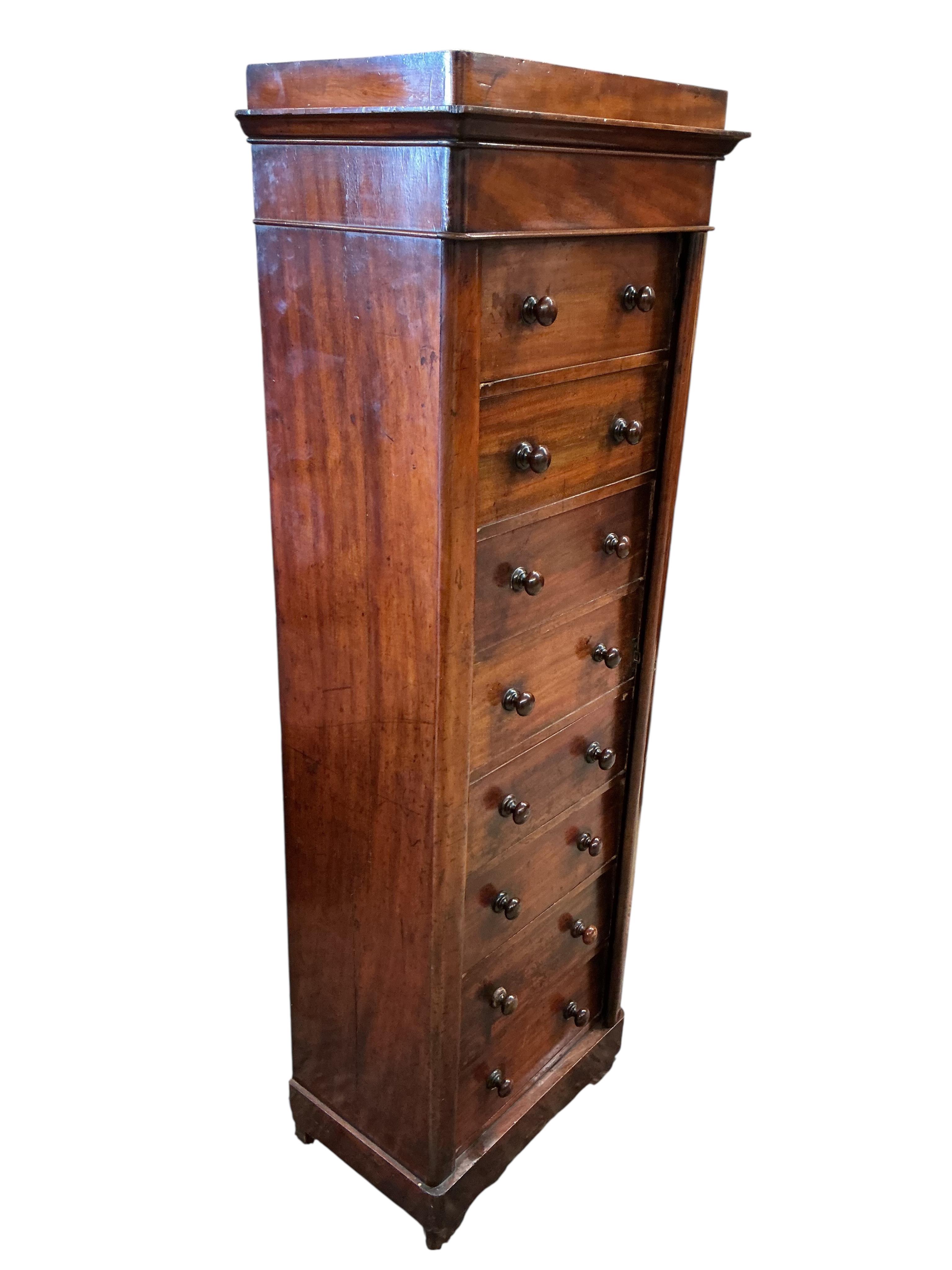 A Victorian mahogany Wellington chest, width 53cm, depth 35cm, height 158cm